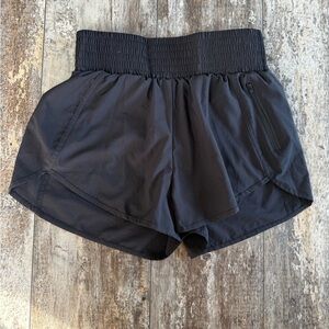 2 for $20 sale: Black high waisted athletic shorts with a side, zipping pocket.